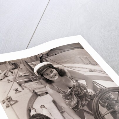 Women at the Helm of Sailboat by Anonymous