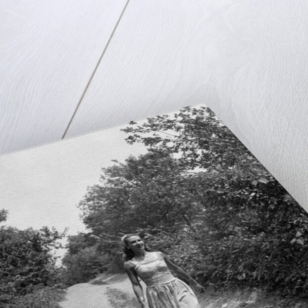 Woman Walking on Country Road by Anonymous