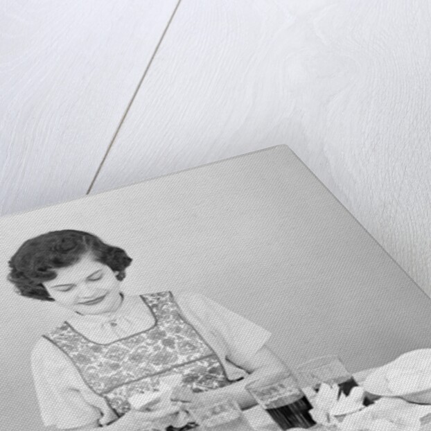 Woman Coloring Easter Eggs by Anonymous