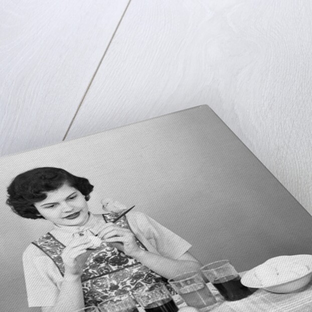 Woman Coloring Easter Eggs with a Paintbrush by Anonymous