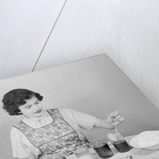 Woman Pulling Egg From Glass/Coloring by Anonymous