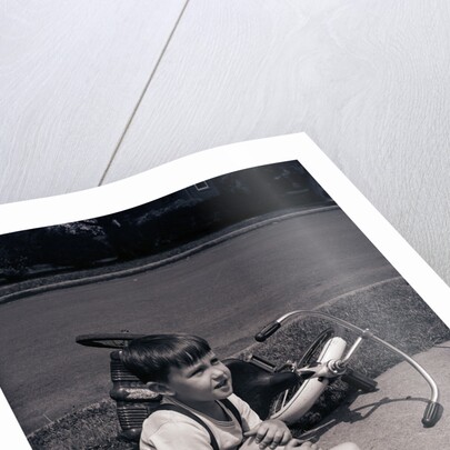 Boy Fallen Off Tricycle and Holding Knee by Anonymous