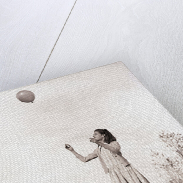 Girl Holding a Balloon by Anonymous