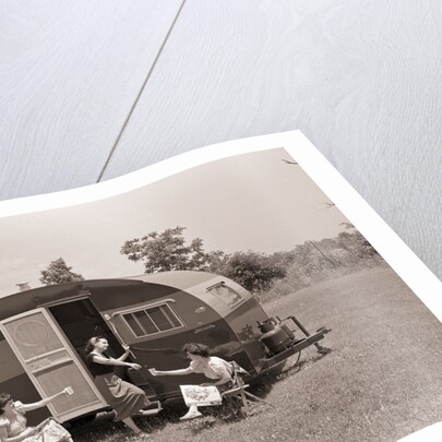 Women Gather Outside Trailer Home by Anonymous