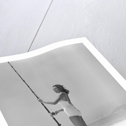 Woman Fishing on Surf by Anonymous