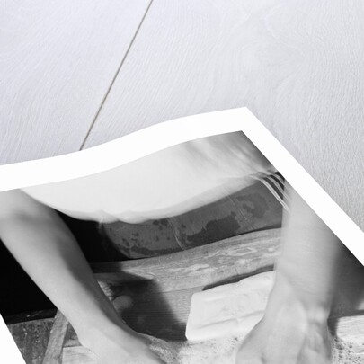 Person Using Washboard by Anonymous