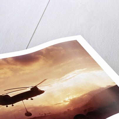 Chinook Helicopter Lifts Ammunition by Anonymous