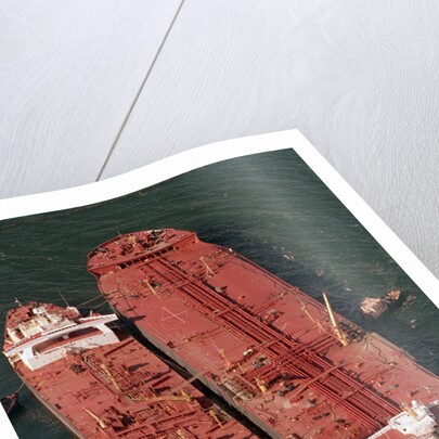 Tanker Pumps Oil from Exxon Valdez by Anonymous