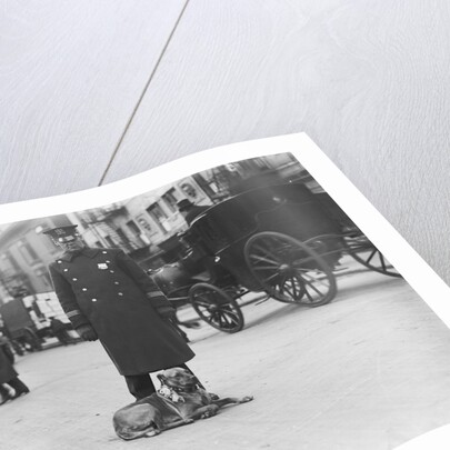 Policeman with Dog by Anonymous