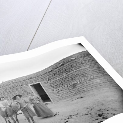 Women and Child Outside Ranch House by Anonymous