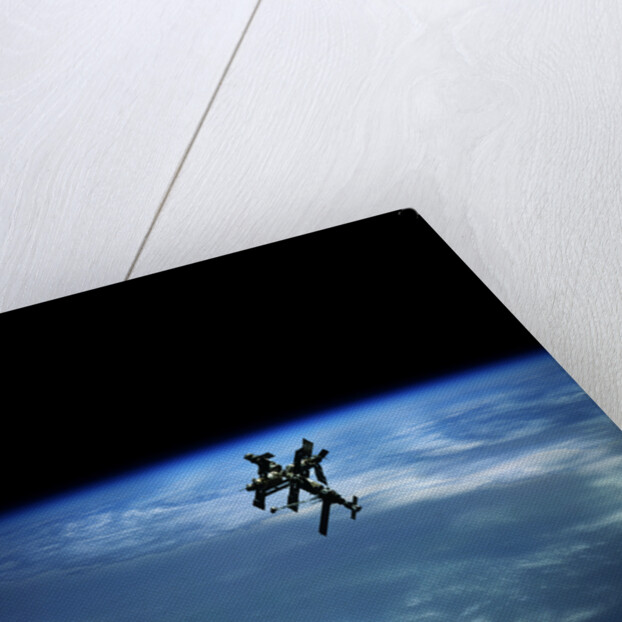 Mir Space Station Orbiting Earth by Anonymous