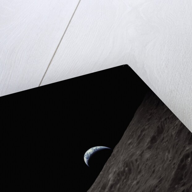 Earth Rising Above the Moon by Anonymous