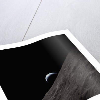 Earth Rising Above the Moon by Anonymous