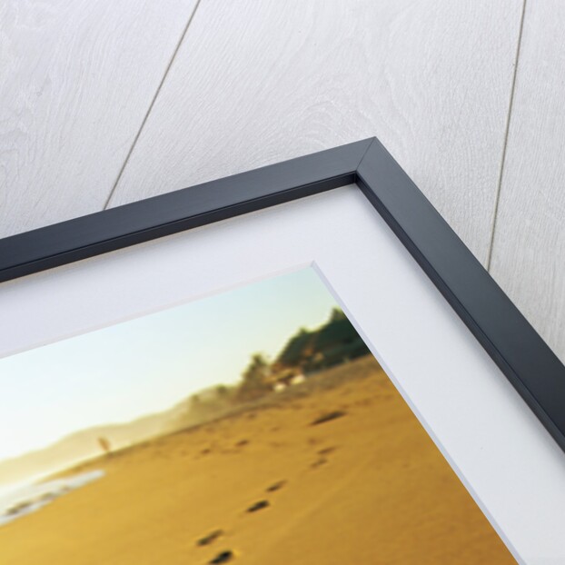 Footprints Along Beach by Anonymous