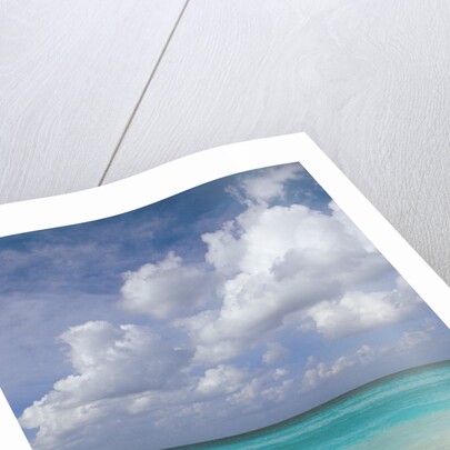 Lone Lounge Chair on Sandy Beach by Anonymous