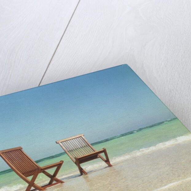 Pair of Wooden Lounge Chairs on Beach by Anonymous