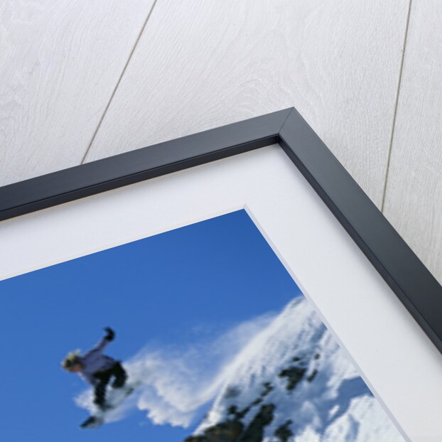 Snowboarder Performing Jump by Anonymous