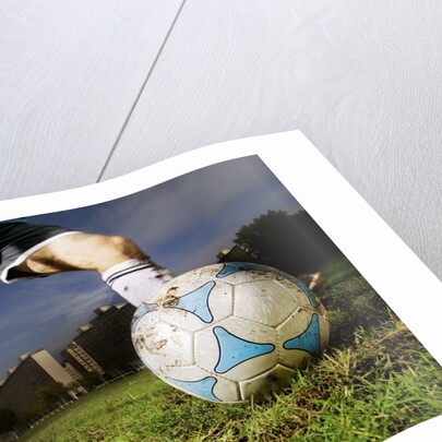 Soccer Player Kicking Ball by Anonymous