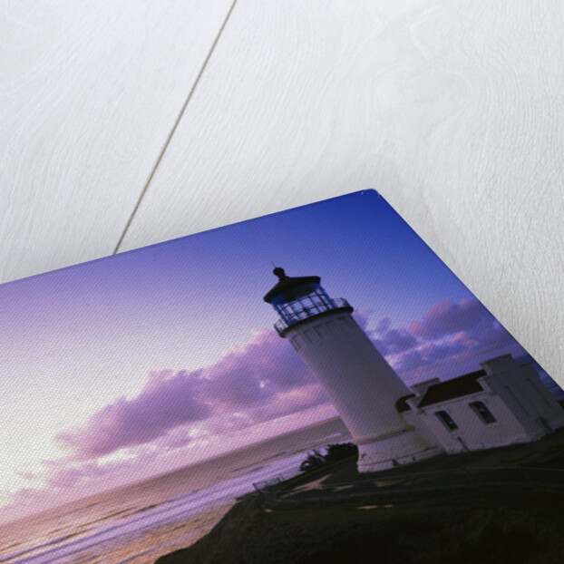 Lighthouse by Beach at Sunset by Anonymous