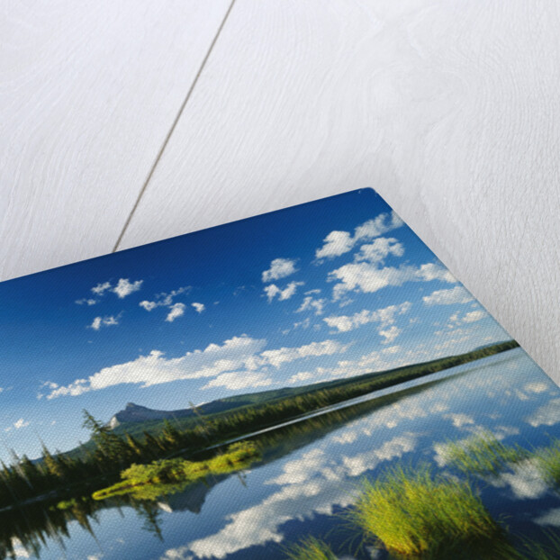 Clouds in Sky Reflected by Mountain Lake by Anonymous