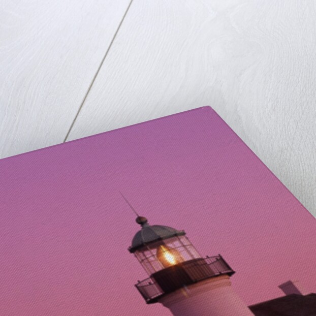 Lighthouse Against a Pink Sky at Twilight by Anonymous