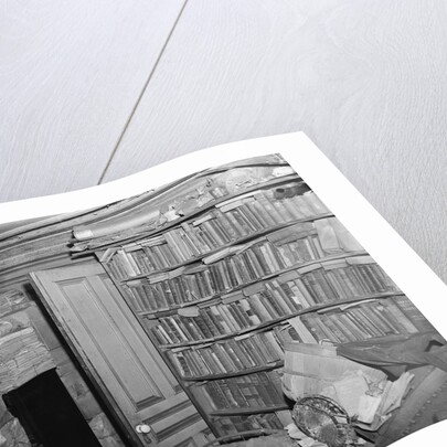 Interior View of a Room Full of Books and Cartons by Corbis