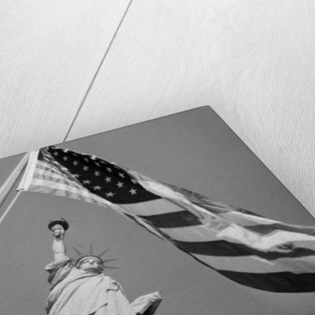 View of Statue of Liberty and American Flag by Anonymous