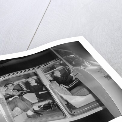 Interior View of Passengers Inside a New York City Checker Cab by Anonymous