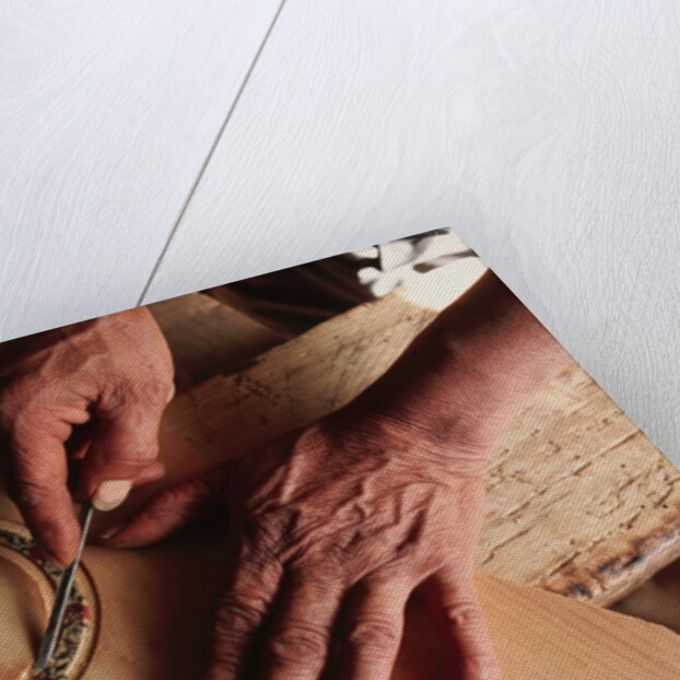 Carving a Guitar Face by Anonymous