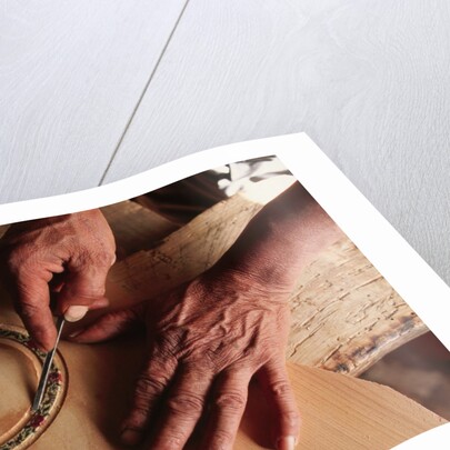 Carving a Guitar Face by Anonymous