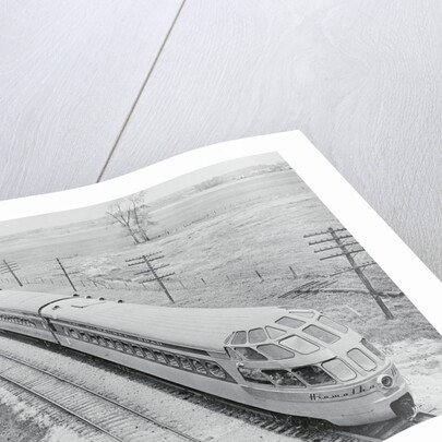 Streamlined Train Cars on Daytime Schedule by Anonymous