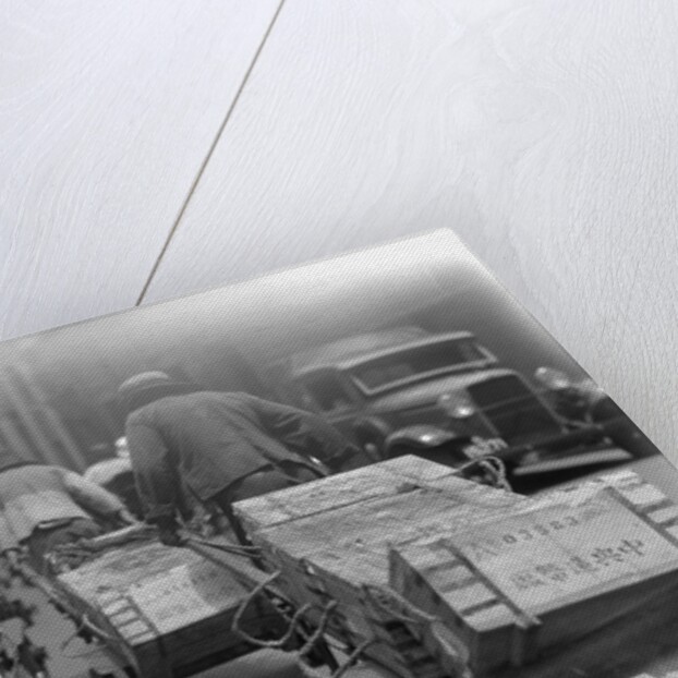 Chinese Men Pulling Heavy Loads of Silver Bullion by Anonymous