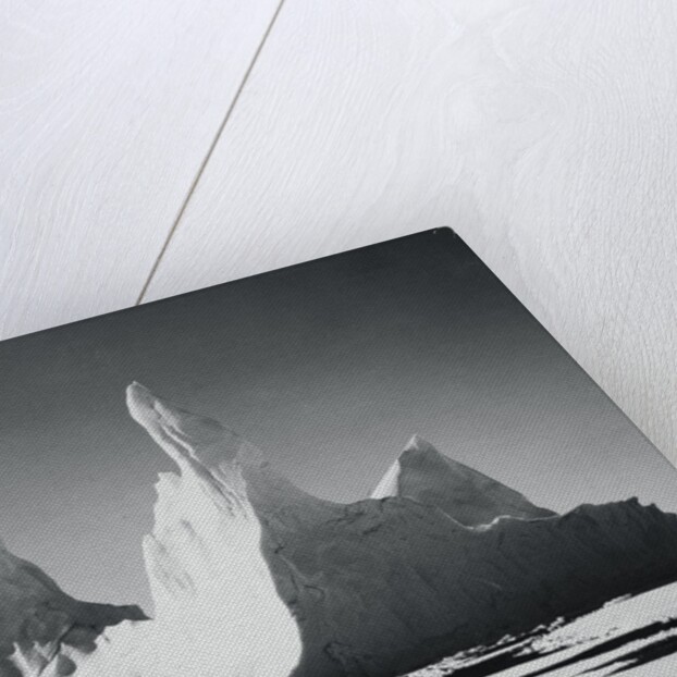 Iceberg Rising From Arctic Waters by Anonymous