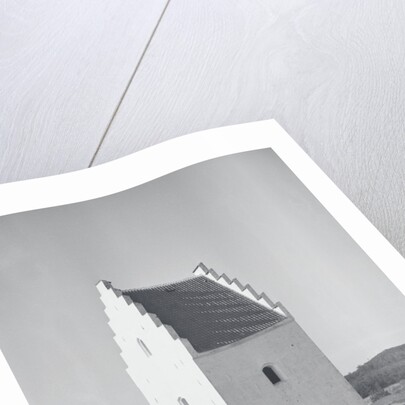 Couple Relaxing in Window of Large Sand Engulfed Church by Anonymous