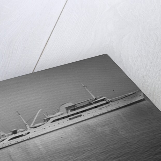 Onasis Yacht Docked Near Shore by Anonymous