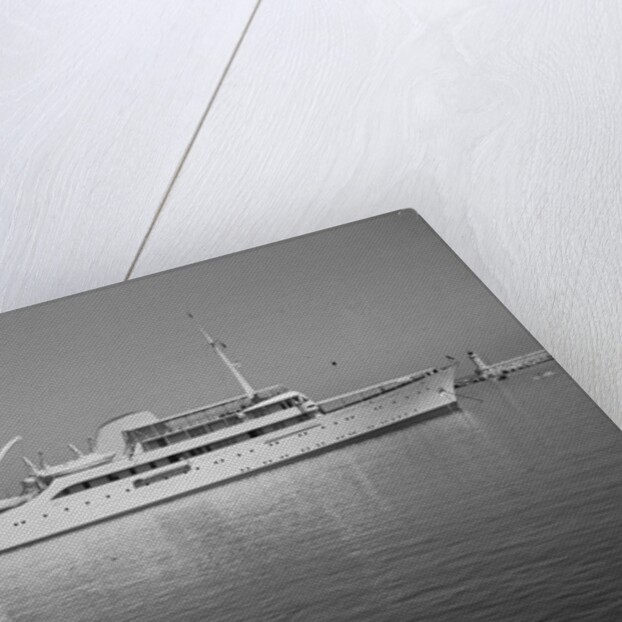 Onassis Yacht Docked on Shore by Anonymous