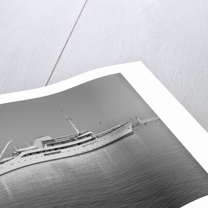 Onassis Yacht Docked on Shore by Anonymous