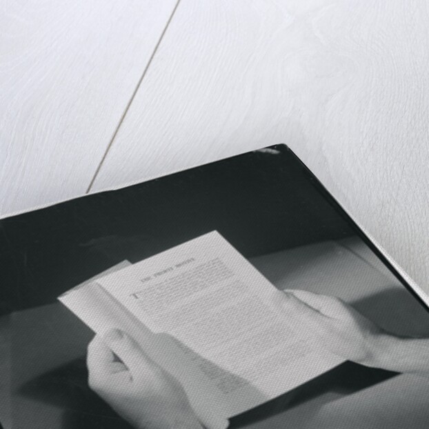 Hands Holding Open Booklet by Anonymous