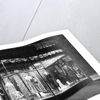 Lighted Window Display of a Dress Shop by Anonymous