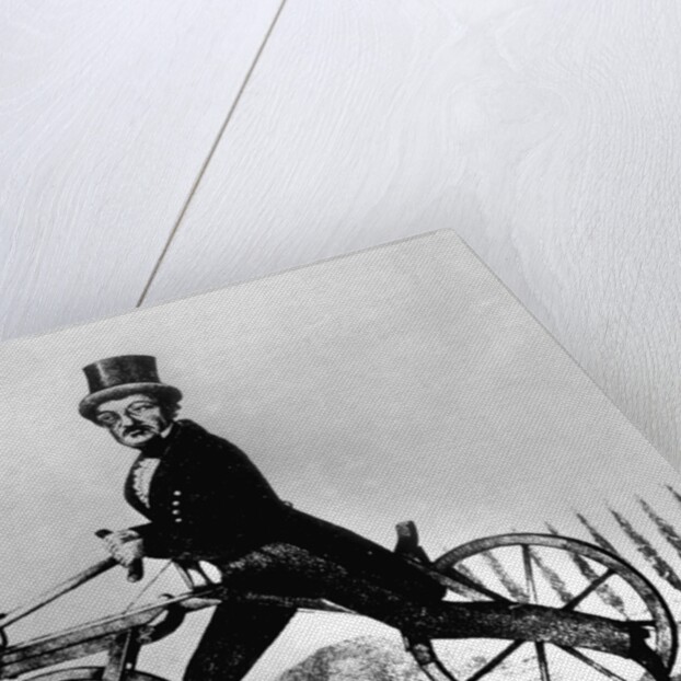 Man Riding Early Bicycle by Anonymous