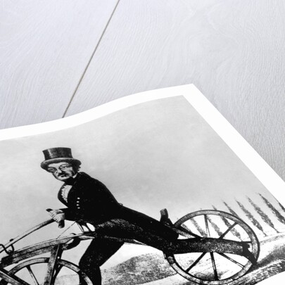 Man Riding Early Bicycle by Anonymous