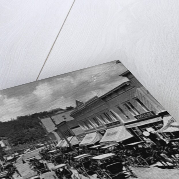 Horse-Drawn Carriages and Storefronts on Mackinac Island by Anonymous