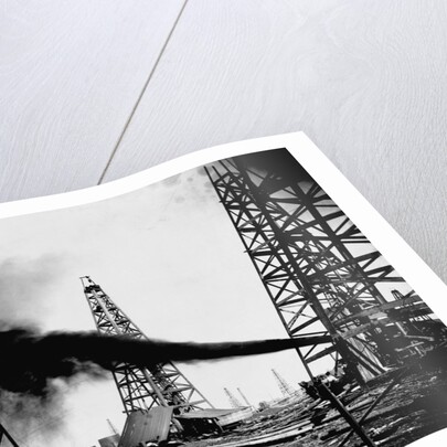 Oil Gushing from Spindletop Hill in Beaumont, Texas by Anonymous