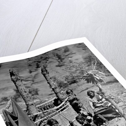 A Navajo Family Outside Their Home by Anonymous