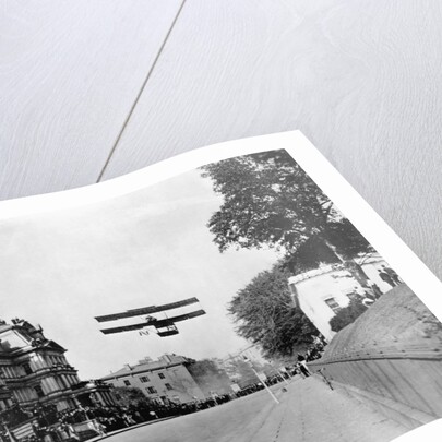 Biplane Flying Over Washington by Anonymous