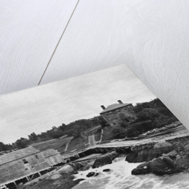 Coastal Buildings and Waterfall by Anonymous