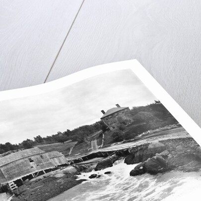 Coastal Buildings and Waterfall by Anonymous