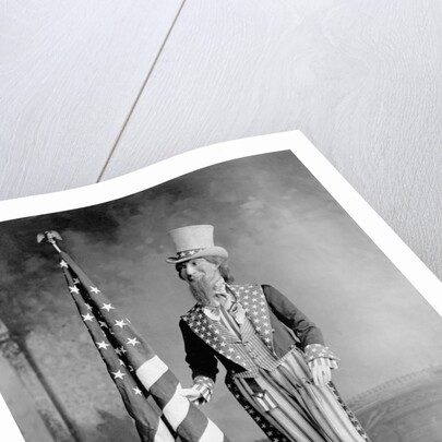 Wooden Uncle Sam and the American Flag by Anonymous