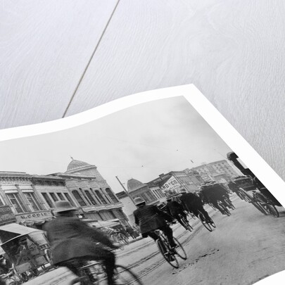 Los Angeles Police Officers Bicycling Past Broadway Storefronts by Anonymous