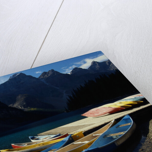 Canoes at Moraine Lake in Banff by Anonymous